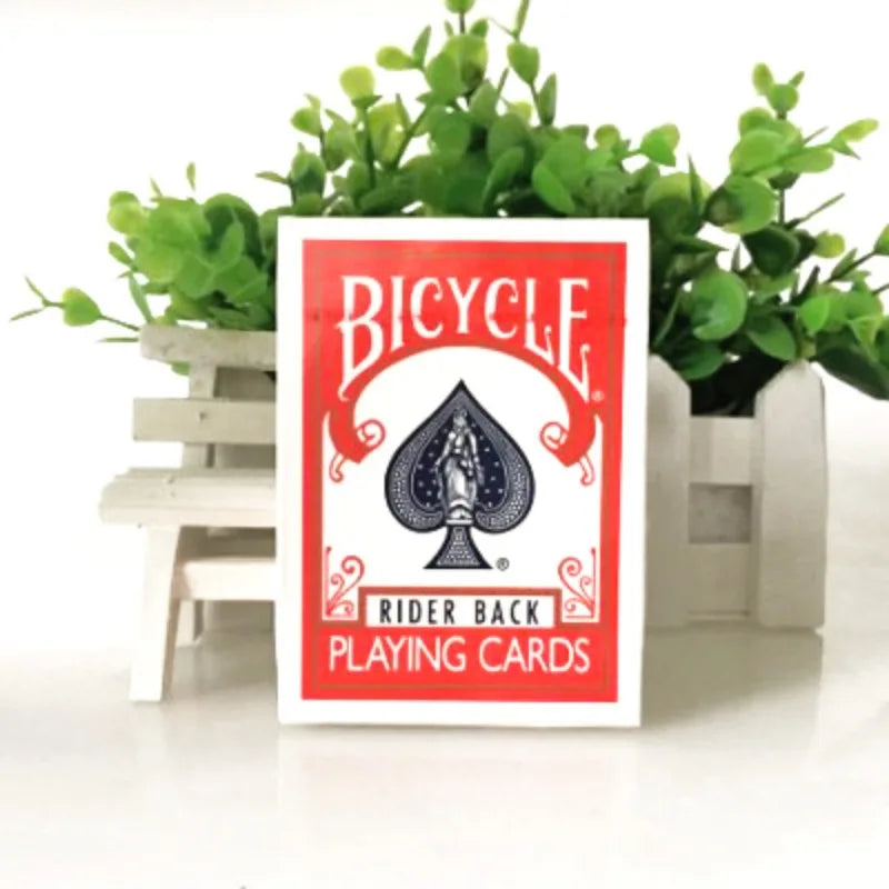 A box of Bicycle Rider Back playing cards with a red label featuring a bicycle design.