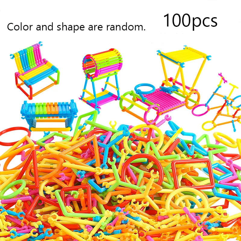 A pile of colorful wooden stick building blocks and colorful plastic toys, including a rainbow-colored chair and a yellow pla