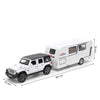 A white diecast metal RV camper truck model with sound and light features shown from the side.