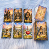A collection of tarot cards featuring mystical imagery and gold accents displayed on a fluffy white background.