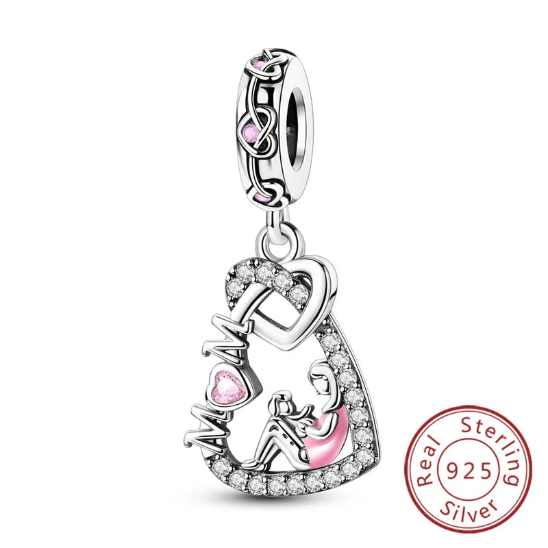 Sterling silver heart charm beads for bracelets featuring an intertwined monogram design