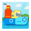 A set of three colorful wooden puzzle pieces shaped like buildings and a cat for a children's activity.