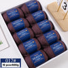 A box of 10 skeins of YEDAN MERIN worsted wool thread yarn in dark brown color.