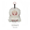 A white fluffy figure resembling a skull panda with pink accents and a black hook.
