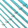 A collection of natural turquoise stone beads of various sizes and lengths, strung together for jewelry making.