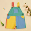 A summer contrast color overalls romper for toddlers in shades of green, yellow, and blue.