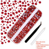A nail art rhinestone kit featuring glass gems, a nail, and tools like a point drill pen and tweezers.