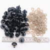 A collection of black and beige plastic safety eyes for amigurumi, including various sizes and locking washers.
