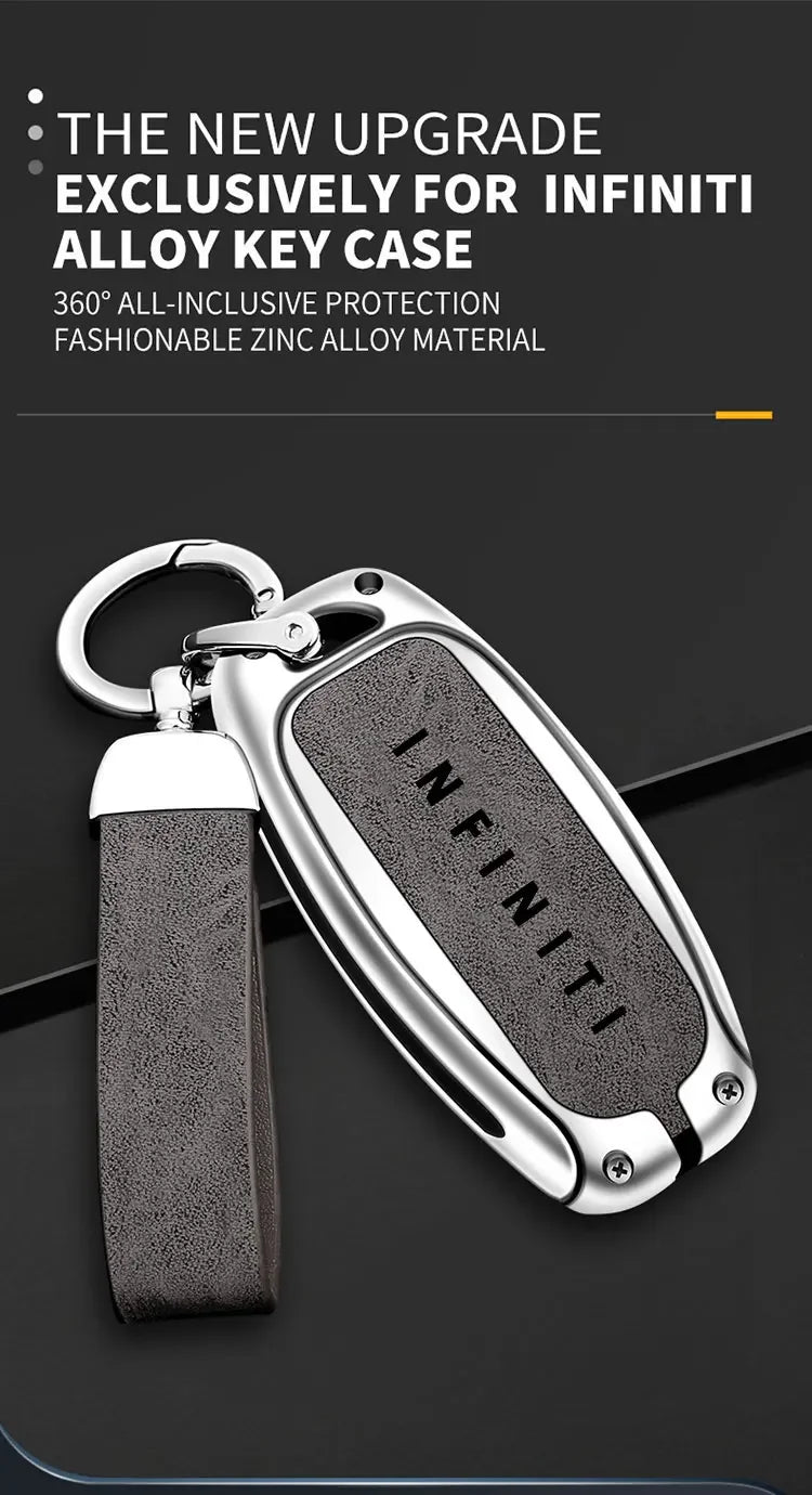 A silver key case cover made of fashionable zinc alloy material with a black textured strap.