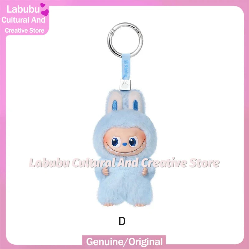 A light blue fluffy Labubu plush doll with a silver keychain attached.