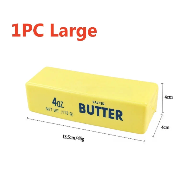 A yellow butter stick fidget toy labeled 4oz salted butter with dimensions of 13.5cm and 4cm.