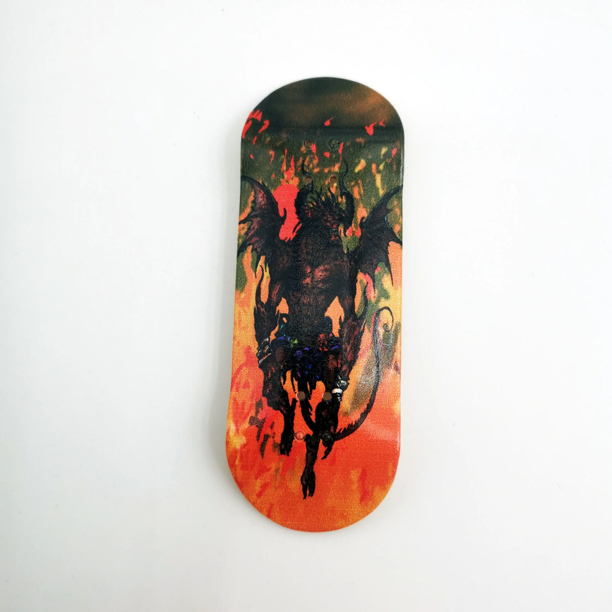 A wooden fingerboard deck with a UV-printed graphic featuring a black silhouette of a dragon against an orange background.