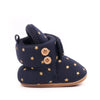 Navy baby winter snow boots with fuzzy ball accents and gold stars