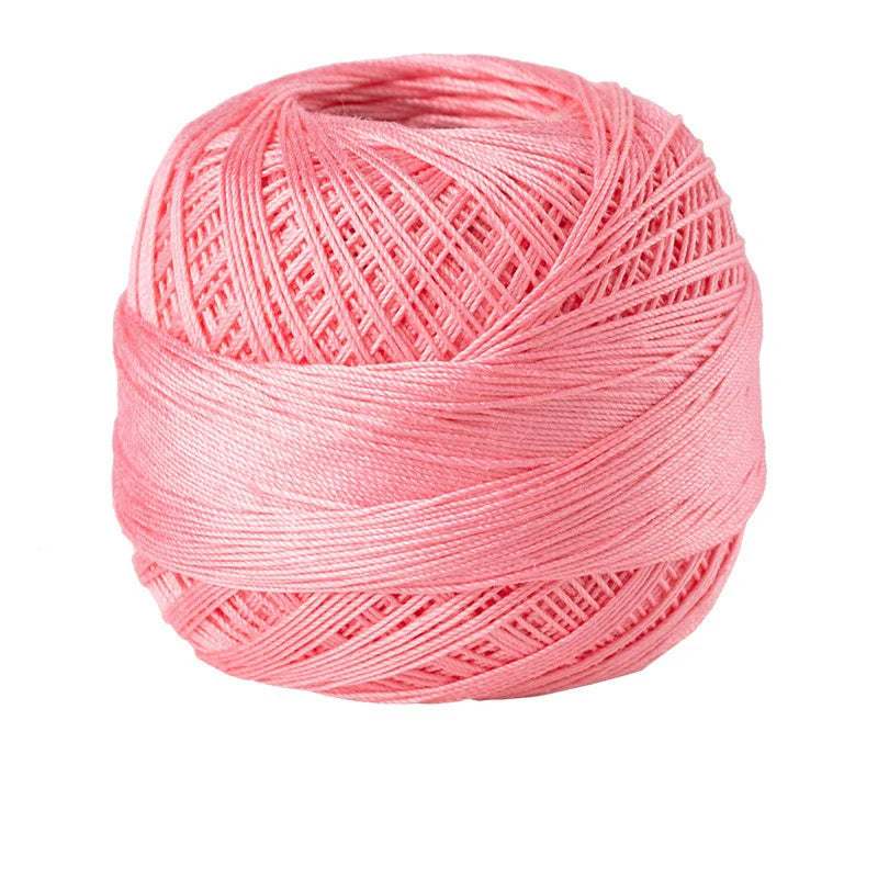 Pink crochet thread for tatting and embroidery, wound into a ball.