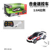 A black and white 1:64 scale alloy remote control car with LED lights and a transmitter.
