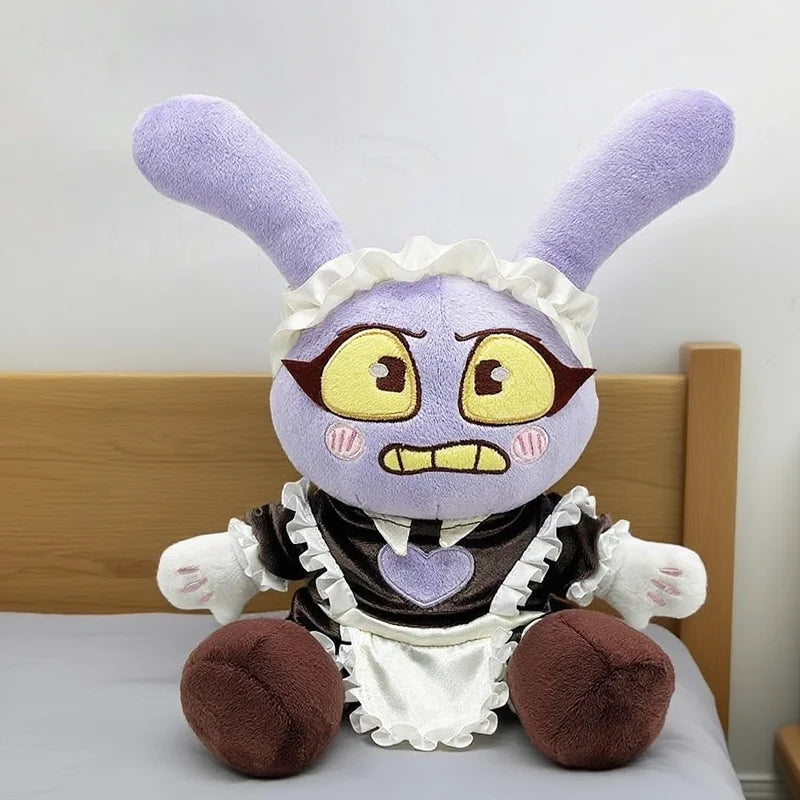 A purple plush doll resembling a rabbit with large ears and a white ruffled collar.