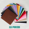 A fan arrangement of 22 sheets of colorful non-woven felt fabric in various shades of green, yellow, orange, pink, and black.