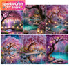 A vibrant diamond painting kit featuring a colorful landscape with pink and purple flowering trees over a reflective water sc