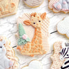 A collection of elephant silicone baking molds for cookies and cupcakes featuring various colors and textures.