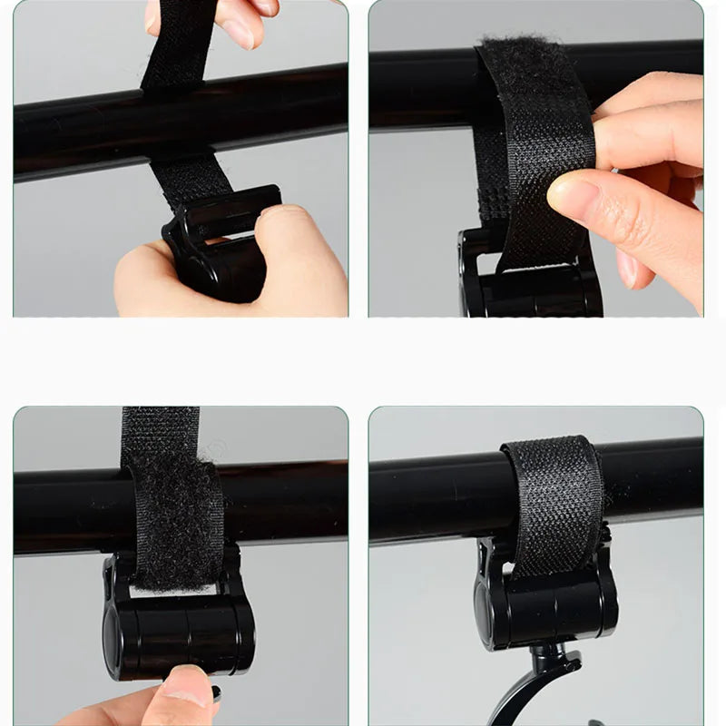 Nahaufnahmen eines schwarzen doppelten Pram-Hakes für Baby-Kinderwagenzubehör, der an einem schwarzen Griff befestigt wird.