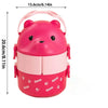 A pink bear-shaped stackable bento lunch box for kids with a lid and cute paw prints