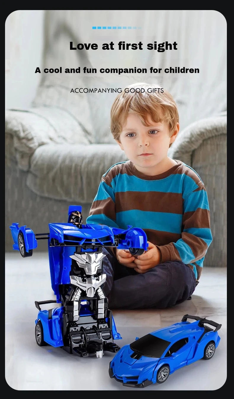 A young boy is holding a blue and black transforming RC robot car toy in a living room setting.