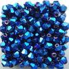 A cluster of bright blue faceted glass bicone beads for jewelry making