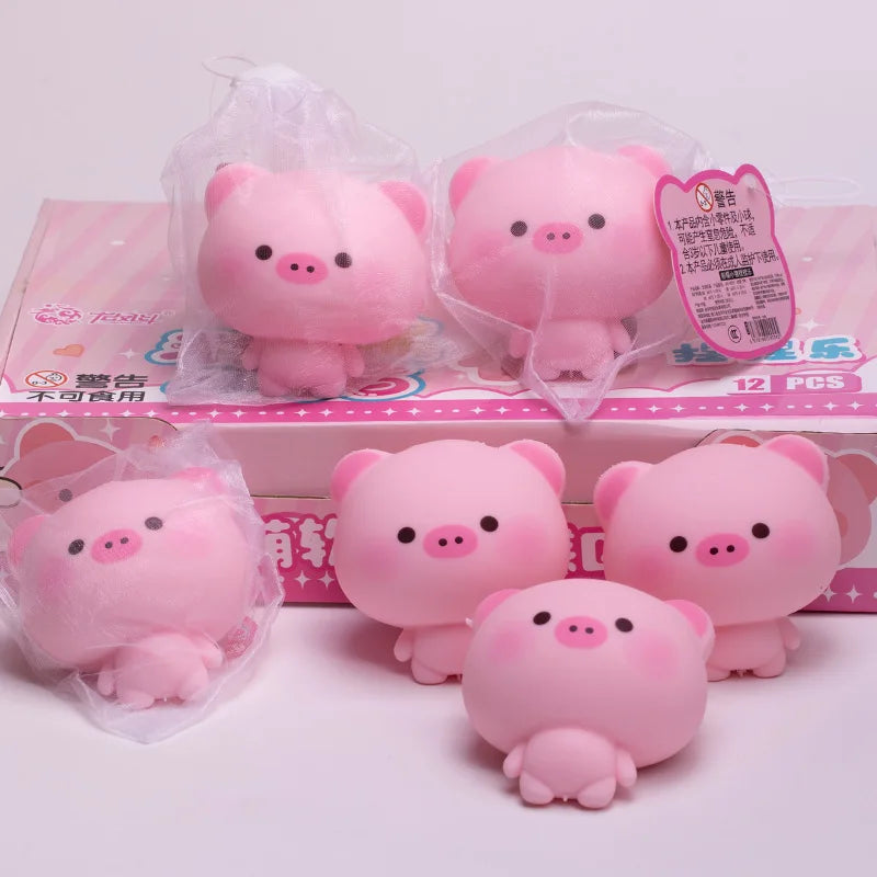 Pink squishy pig stress relief toys packaged in clear plastic bags