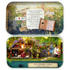 A vintage tin box featuring a scene of a countryside garden and notes about rabbits and happiness.