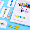 A collection of colorful wooden clip beads and corresponding cards for a Montessori fine motor skills game.