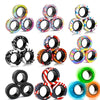 A collection of magnetic fidget spinning rings in various colors and patterns for stress relief.