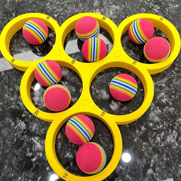 A yellow plastic ring holder with eight circular pink and striped pool balls arranged in a honeycomb pattern.