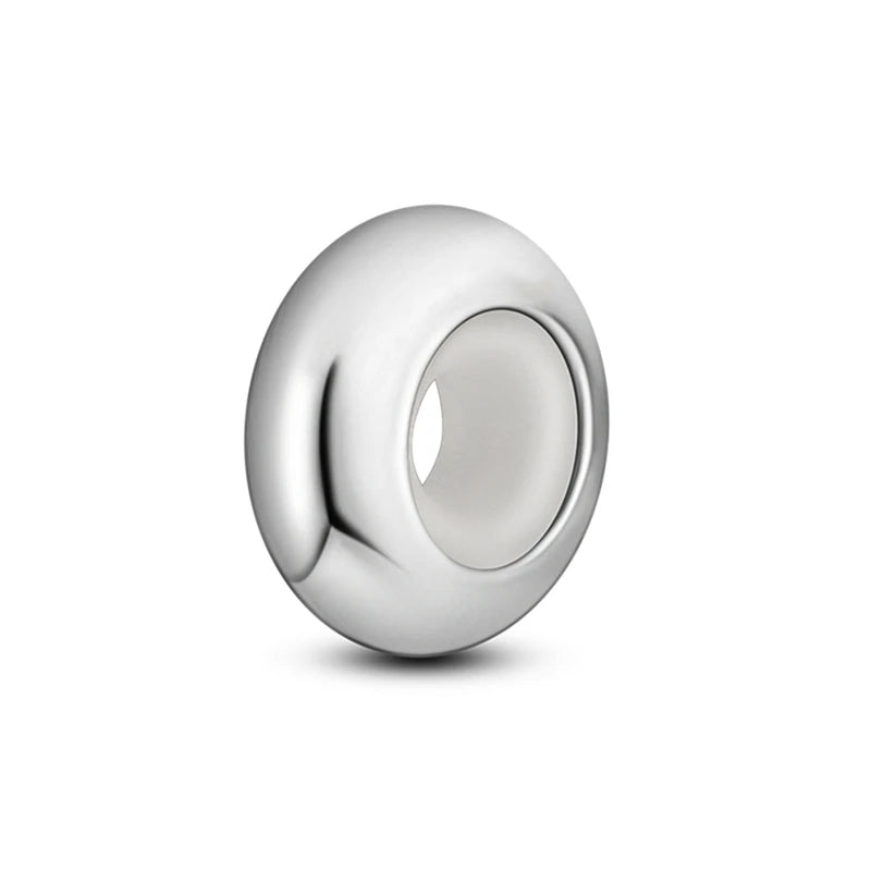 A silver charm bead with a smooth, round shape and a central hole.