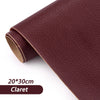 A roll of dark maroon claret self-adhesive PU leather repair patches for fabric