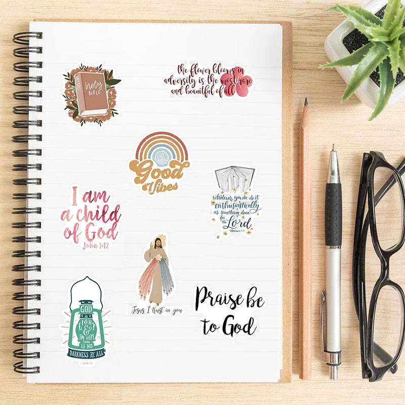 A notebook page featuring various religious and inspirational Bible verses and designs for stickers.