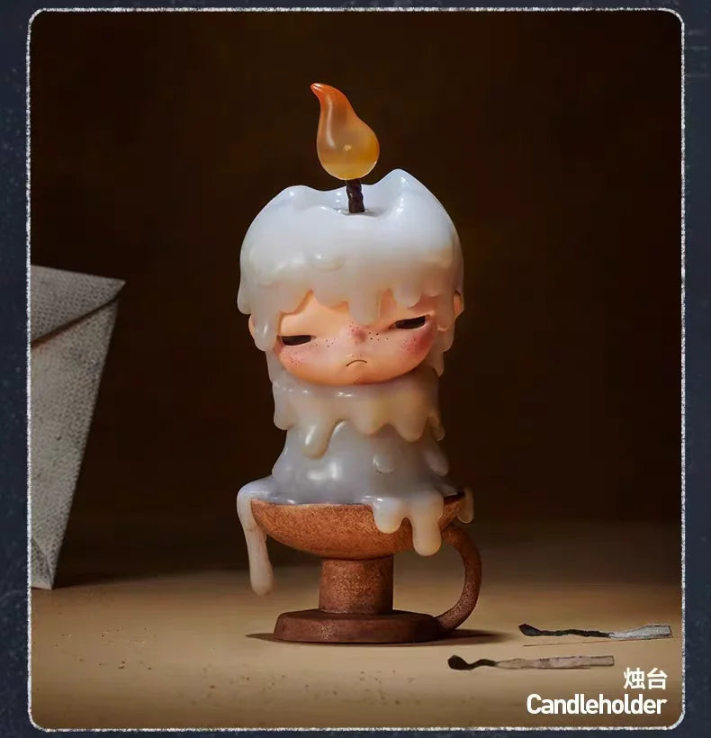 A white candle-shaped collectible figurine with a glowing flame sits on a terracotta holder.