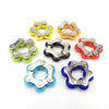 A collection of colorful flippy bike roller chain fidget toys in various colors like yellow, orange, green, and blue.