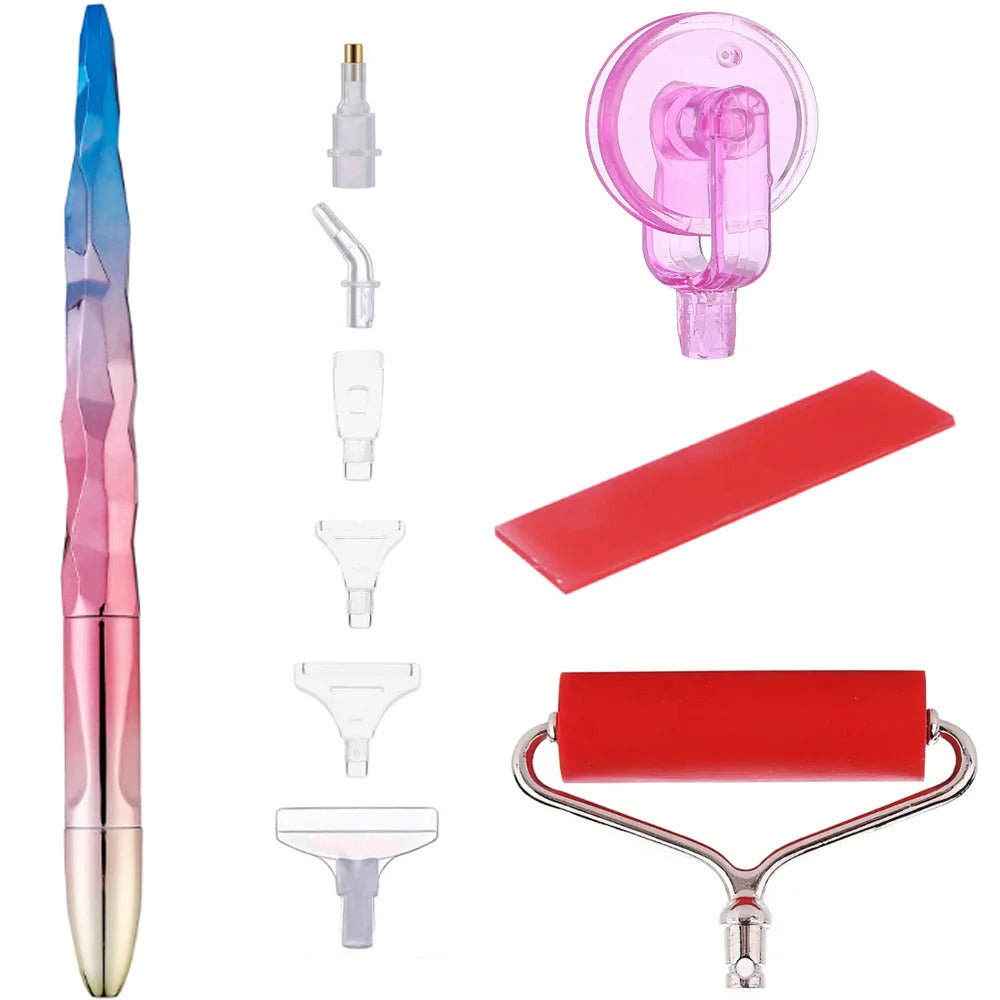 A kit of diamond painting tools including a pen, roller tool, and various shaping tools.