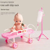 Pink emergency stretcher toy with wheels and a doctor set for role play