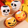 A set of Halloween sensory toys featuring orange pumpkin and white skull squeeze stress balls.