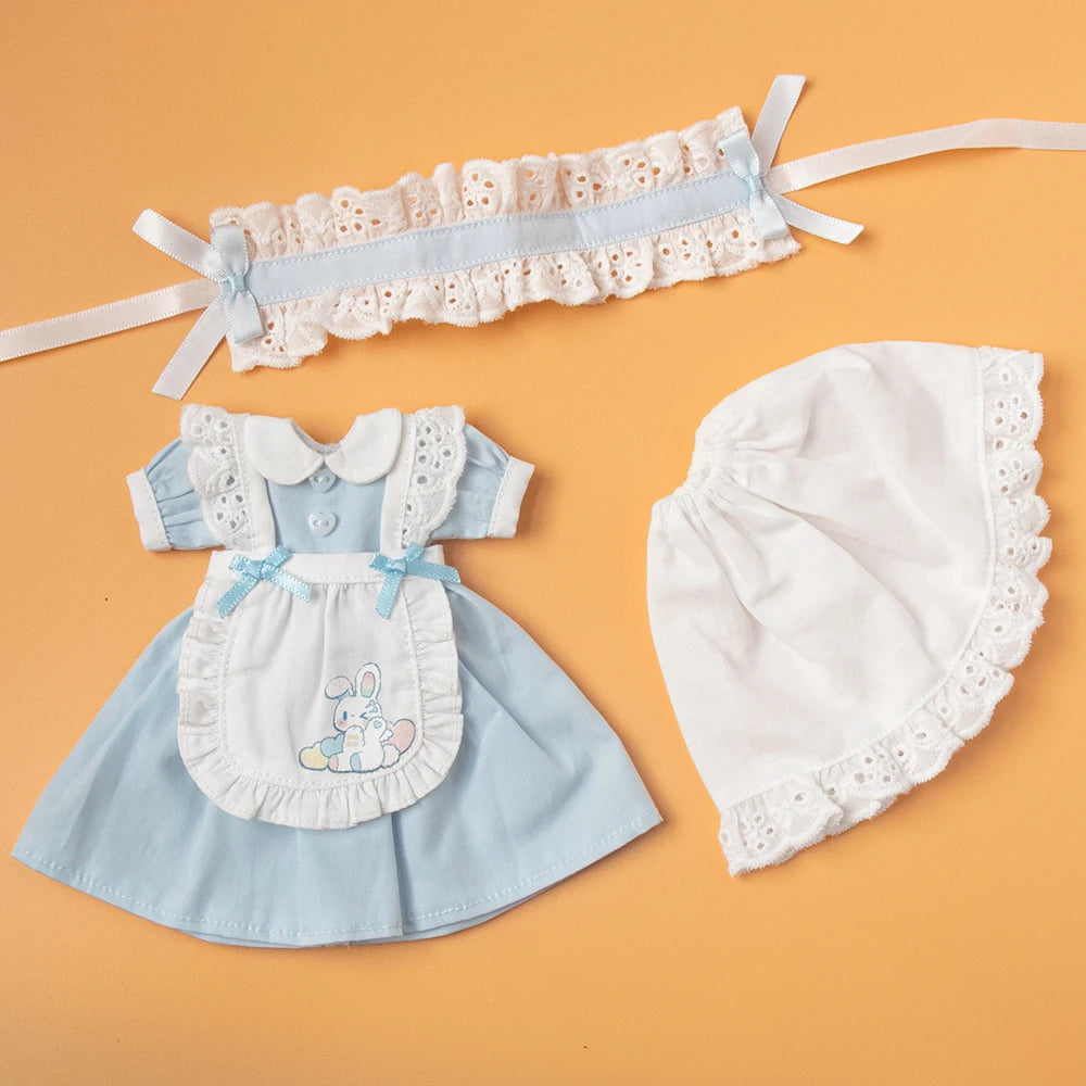 A light blue vintage lace maid dress set for dolls featuring a bodice, skirt, and matching headband.