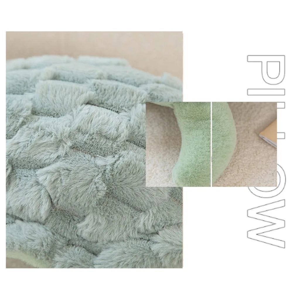 Close-up of a soft, light blue sea turtle plush toy with a textured, fluffy surface.