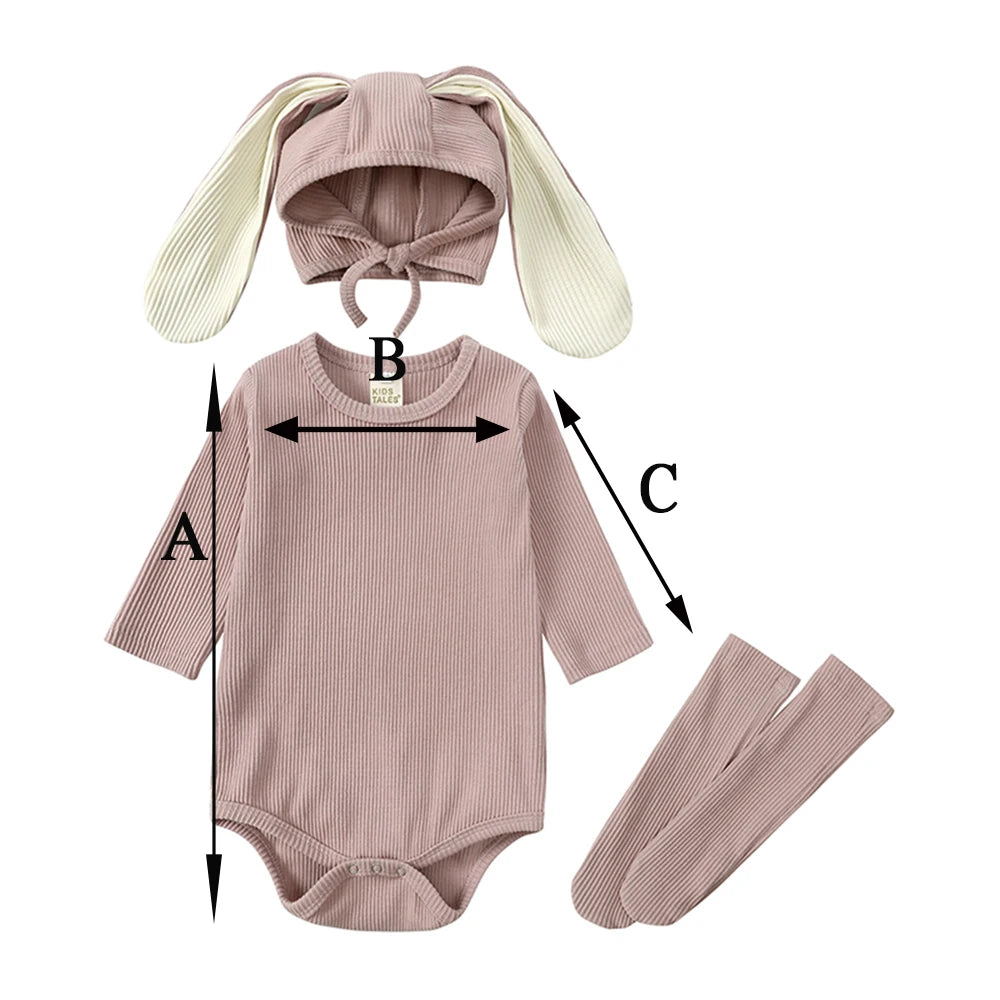 A mauve baby romper set featuring a rabbit hat and matching socks.