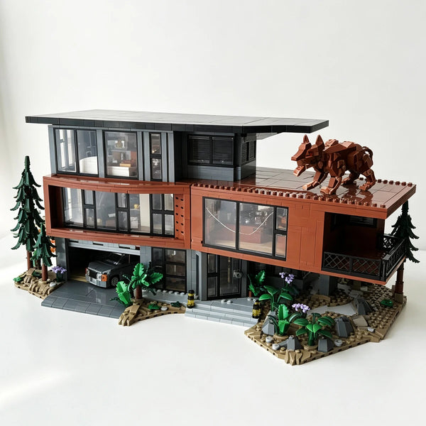 Maquette détaillée d'un manoir vampire hanté en briques brunes et noires, avec aménagement paysager.