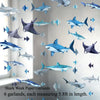 A set of six geometric shark paper garlands hanging in a vertical display.
