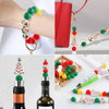 A collection of Christmas tree silicone beads in red, green, and white are shown on a bracelet and strung for jewelry making.