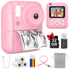Pink instant print camera with a lens, film roll, and accessories like cables and pens.