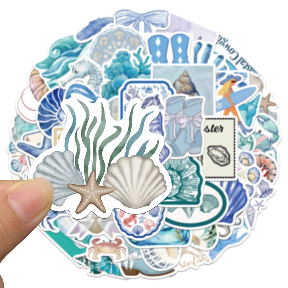 A circular sticker pack featuring various ocean life like starfish, shells, and sea creatures in blue and green tones.