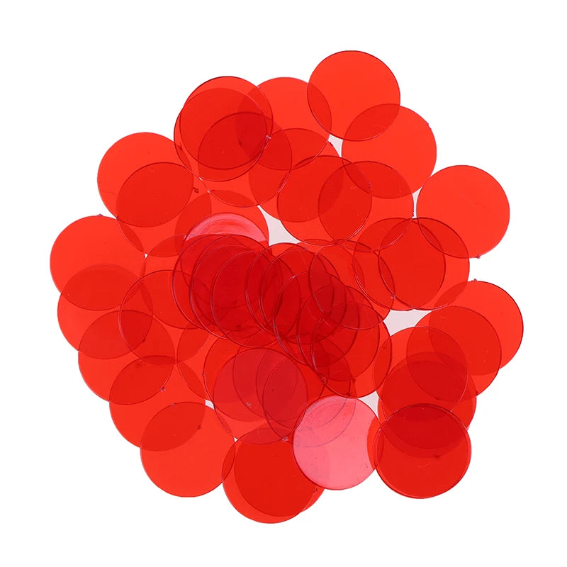 A pile of 50 red plastic bingo chips for games and family fun