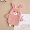 A pink plush-covered hot water bottle shaped like a bunny with long ears